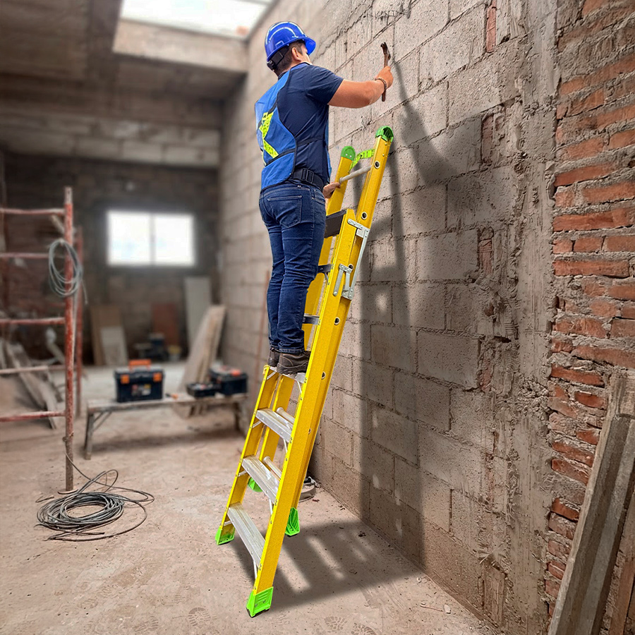 Louisville multipurpose ladder used as an extension ladder against a wall.